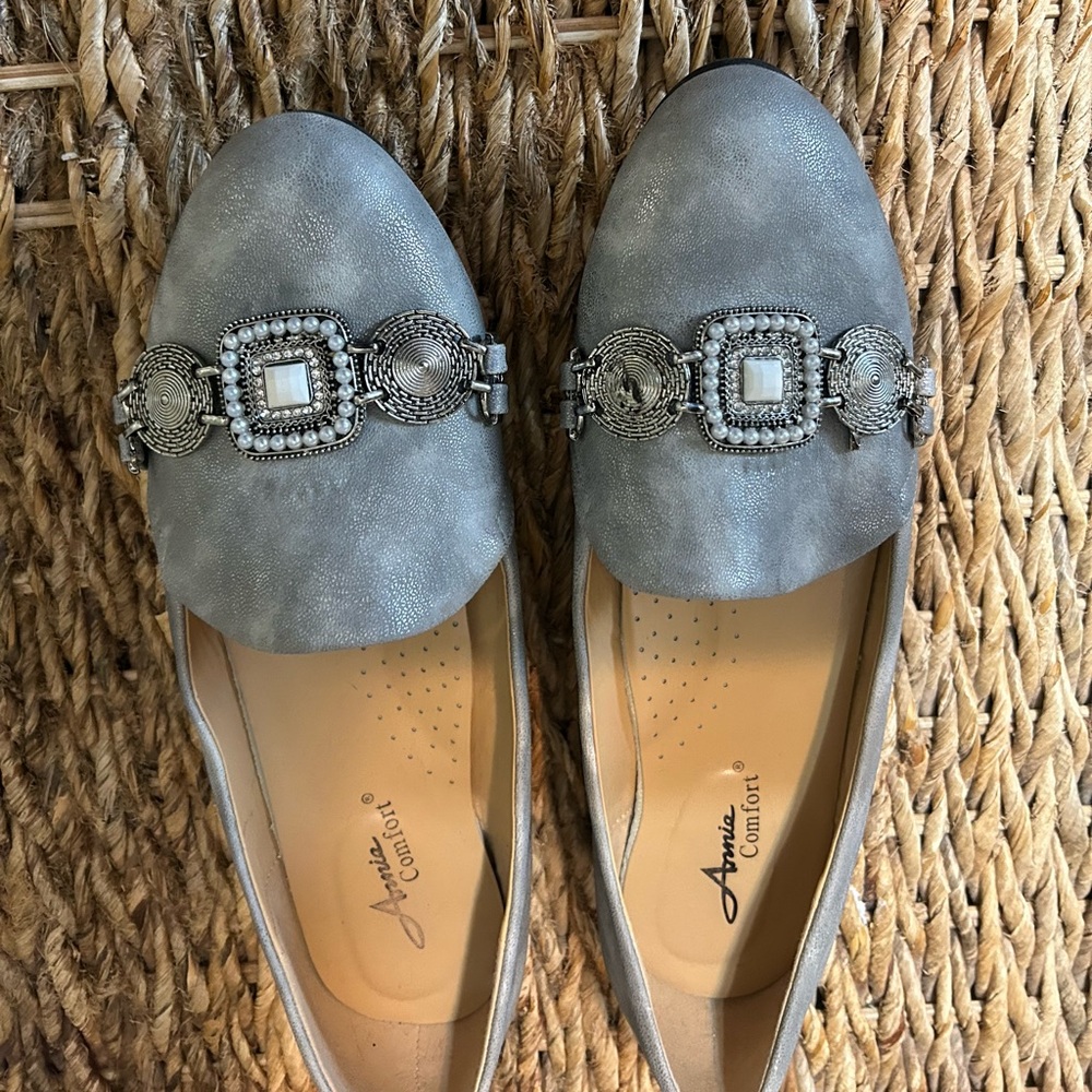 Women’s silver shoes with silver buckle